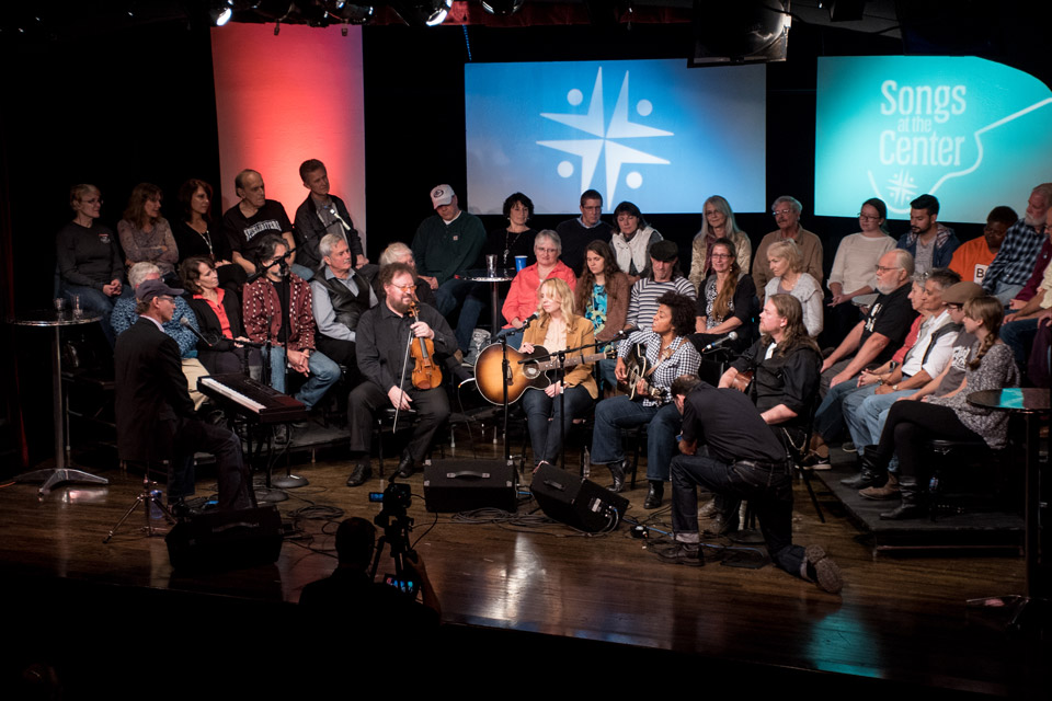 Digest-Main-Dan-Mitchell Songs at the Center on stage