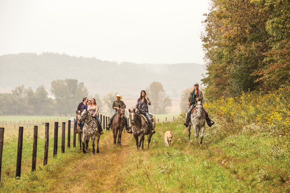 People riding at Spotted Horse Ranch (photo by Laura Watilo Blake)