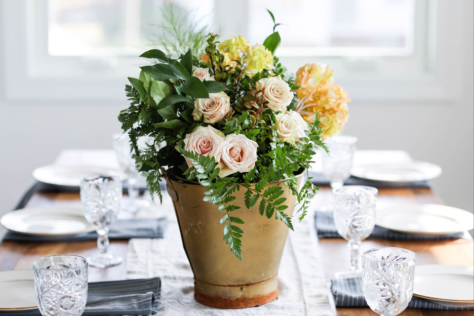 Flowers in bucket at Flowers & Bread