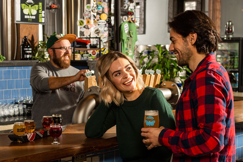 People talking at Nocterra Brewing Co.