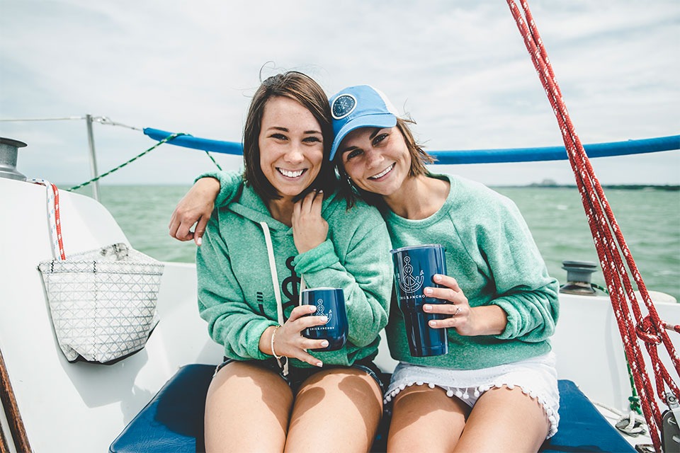 Women on boat wearing Erie & Anchor clothing (photo courtesy of Erie & Anchor)