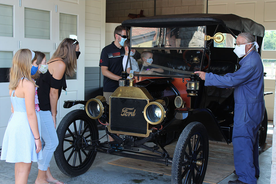 Willie Harman explaining the features of a 1914 Model T