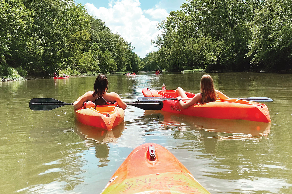 Two women in kayaks (photo by Madison Farley) Two women in kayaks (photo by Madison Farley)