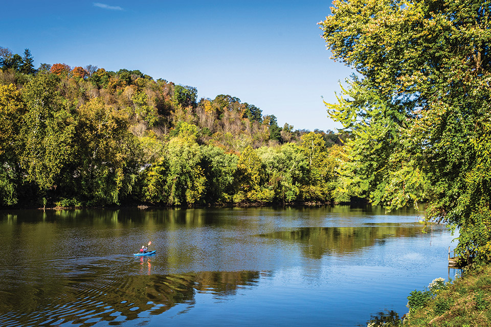 Person paddling on the Muskingum River (photo by Laura Watilo Blake)