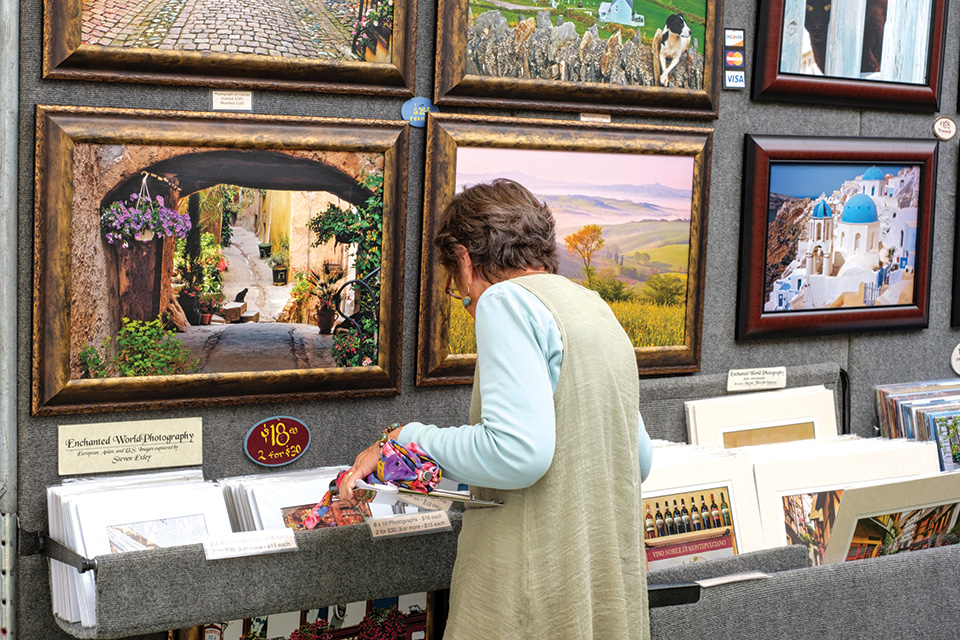 Woman looking at art (photo courtesy of Crosby Festival of the Arts)