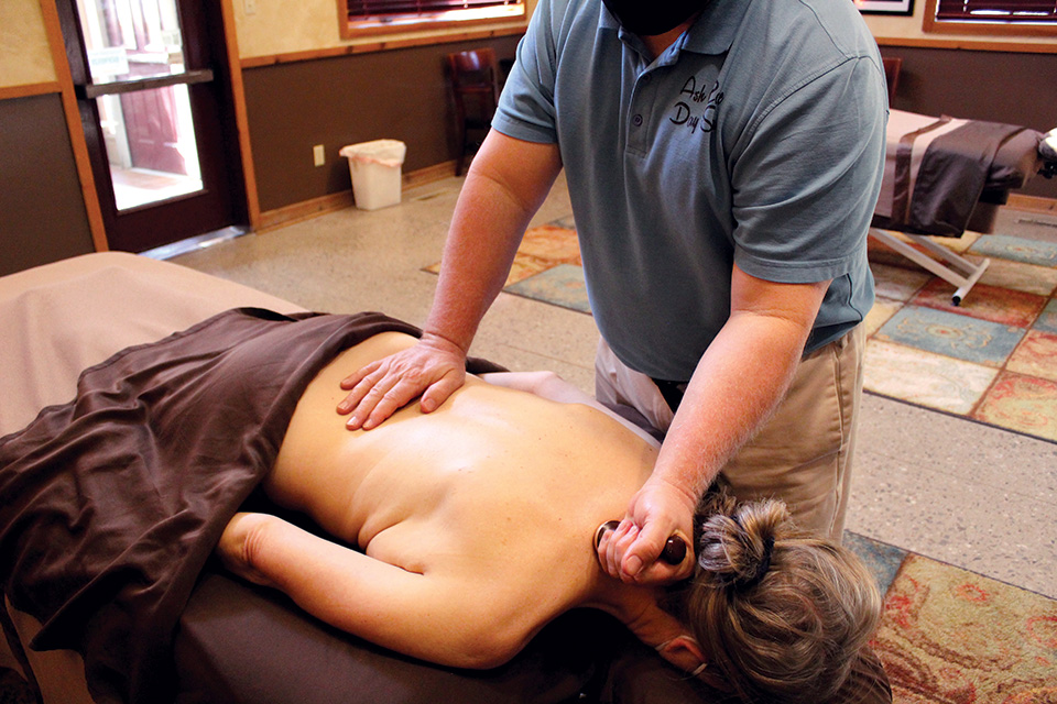 Woman getting a massage at Ash Cave Day Spa (photo by Hocking Hills Tourism Association)
