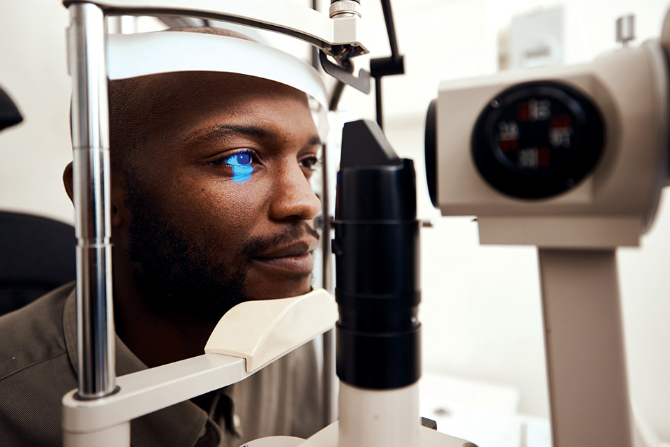 Man taking an eye exam (photo by iStock)