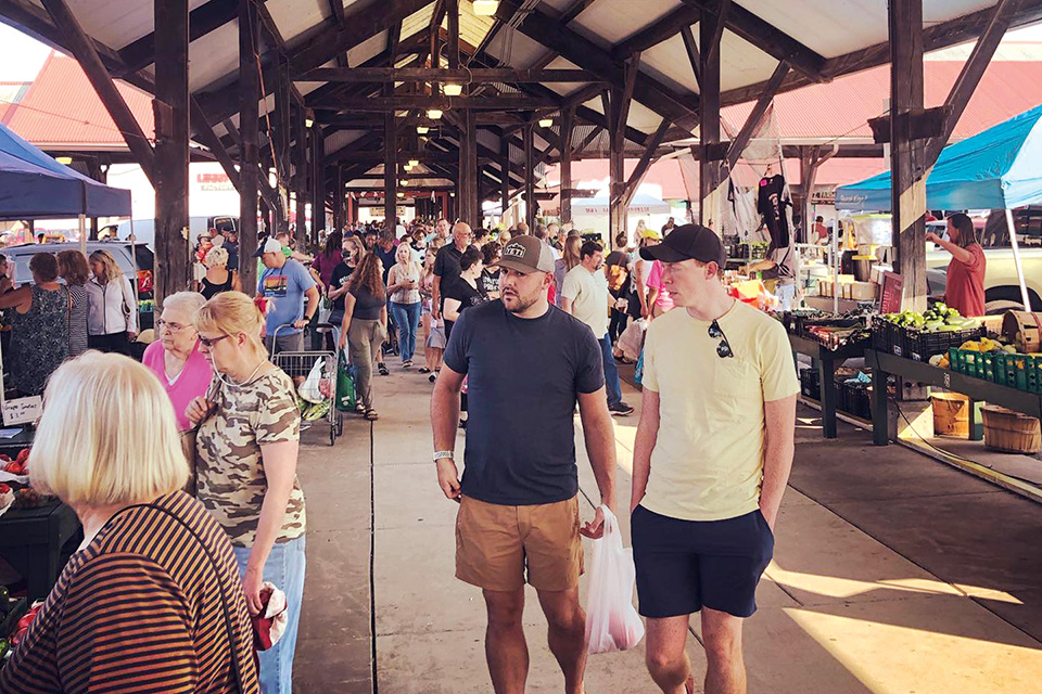 People walking at Toledo Farmers’ Market