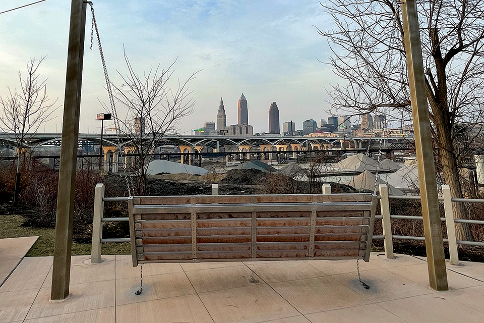 Swing overlooking bridges and downtown Cleveland along Towpath Trail (photo by Jim Vickers)