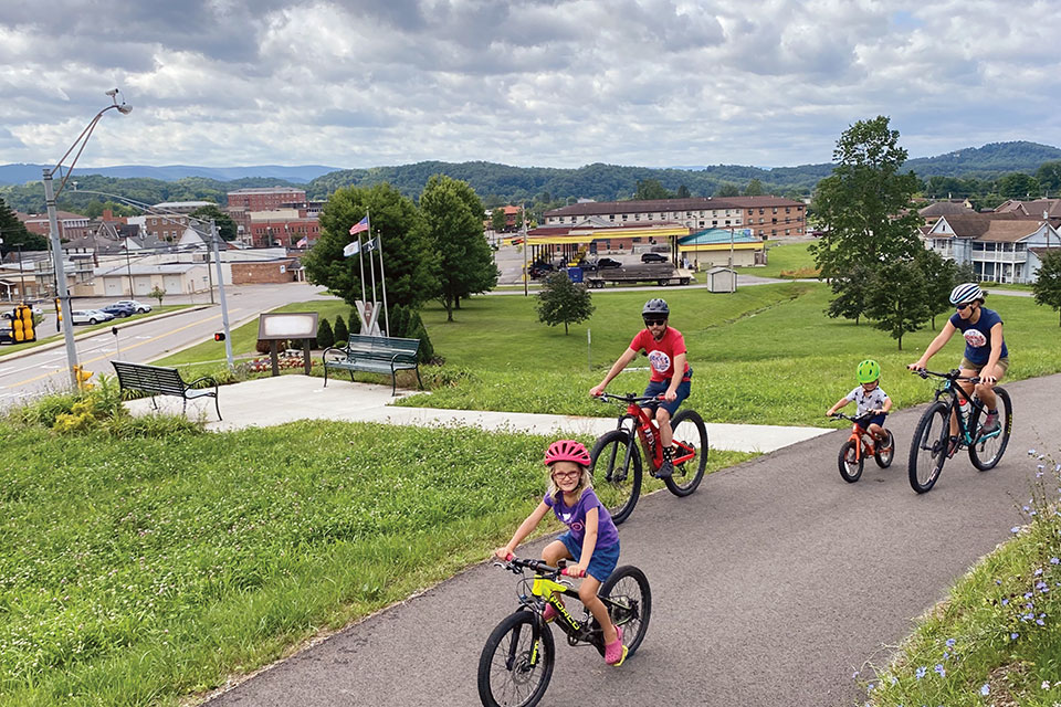 Family biking on the Allegheny Highlands Trail (photo courtesy of Elkins-Randolph County Visitors Bureau)