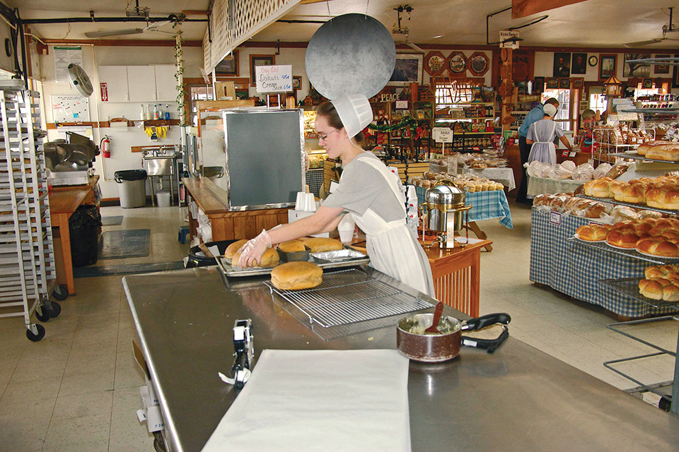 Woman baking at Yoder's Bakery (photo by Adams County Travel & Visitors Bureau)
