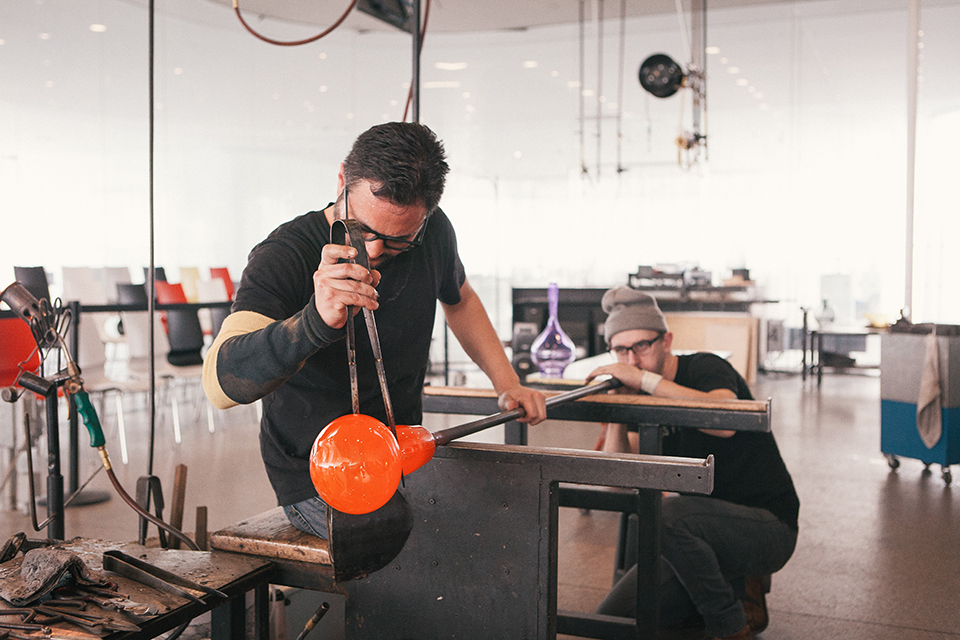 Men working on glass art (photo courtesy of Toledo Museum of Art)