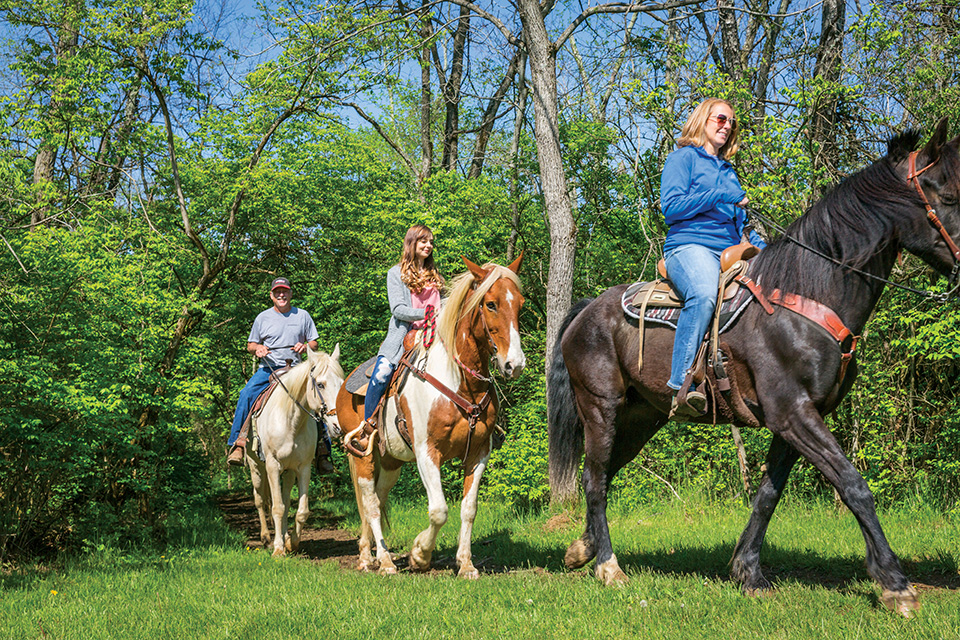 People riding horses at Nation Road Horse Rental (photo courtesy of Travel Butler County)
