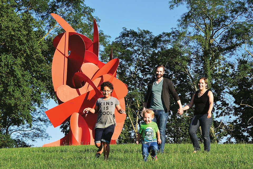 Family walking at Pyramid Hill Sculpture Park & Museum (photo courtesy of Travel Butler County)
