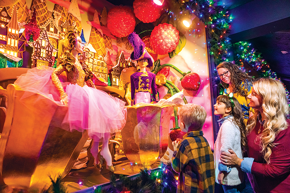 Moms and children looking at Castle Noel display in Medina (photo by Laura Watilo Blake)