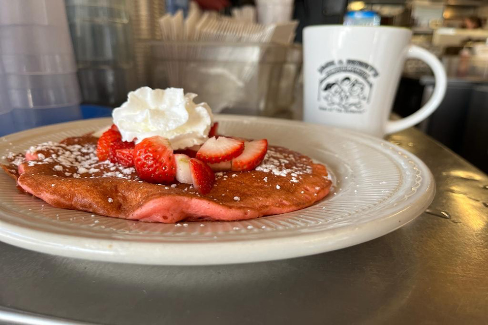 Strawberry pancakes with whipped cream at Jack & Benny’s in Columbus (photo by Hilda Garcia)