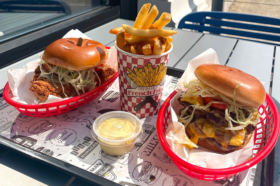 Chicken sandwich, french fries and burger at Cincinnati’s Milkman (photo courtesy of Milkman)