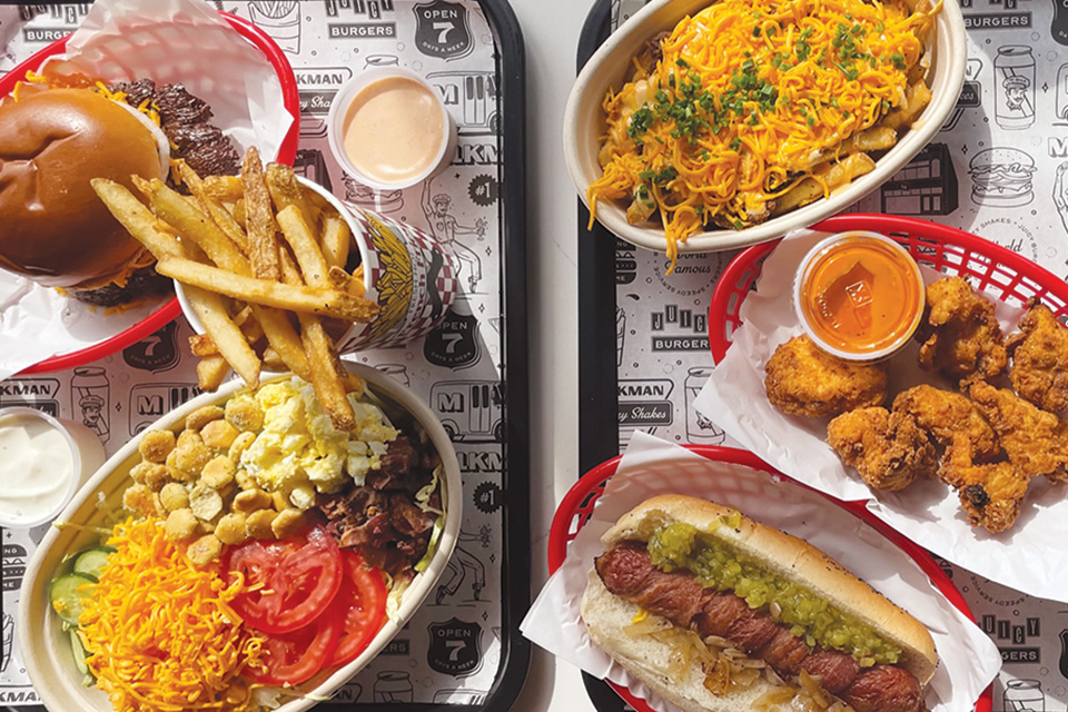 Chili fries, chicken nuggets, hot dog, burger, fries and salad at Milkman in Cincinnati (photo courtesy of Milkman)