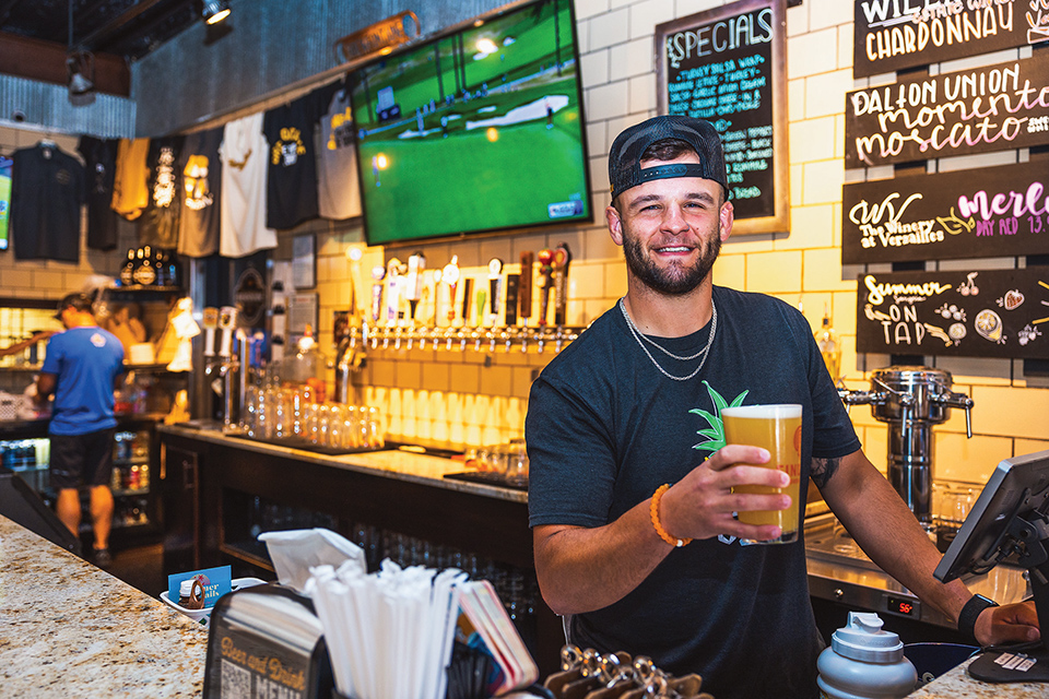 Bartender holding beer at Brewfontaine in Bellefontaine (photo by Matt Shiffler)