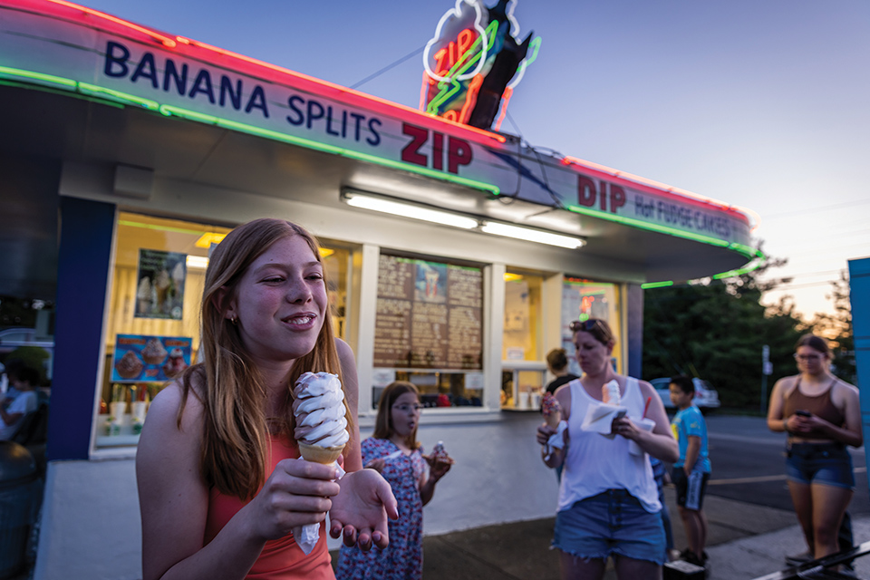 Girl eating ice cream cone outside Zip Dip in Cincinnati (photo by Matthew Allen)