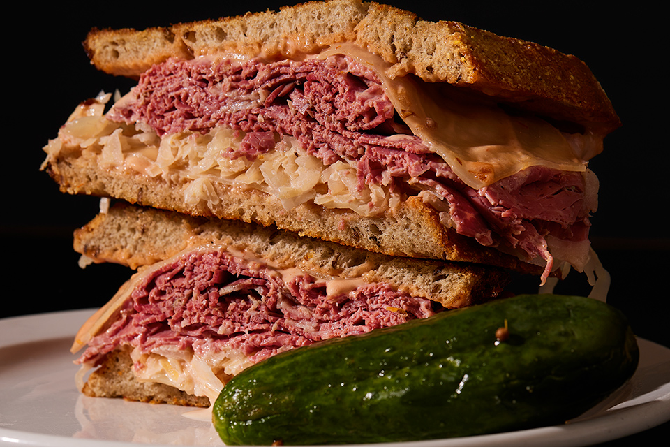 Corned beef Reuben and pickle at Katzinger’s Delicatessen in Columbus (photo by Brian Kaiser)