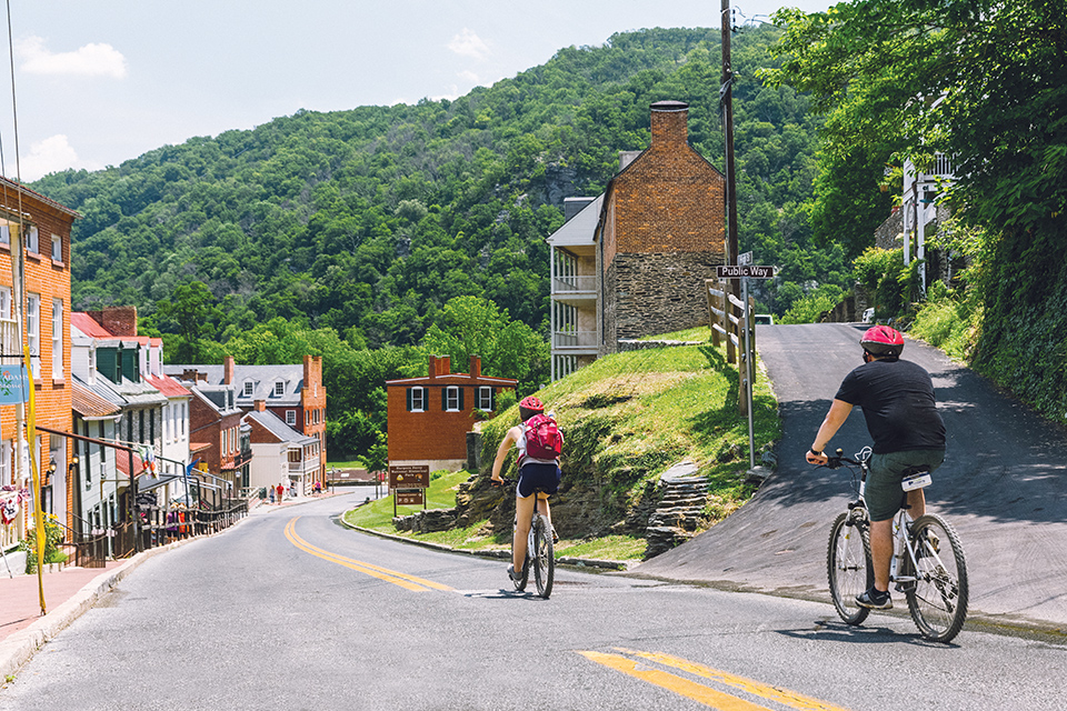 People cycling down a road in Jefferson County, West Virginia (photo by Chris Weisler)