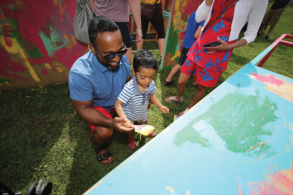 Father and son painting at the Columbus Arts Festival (photo by Joe Maiorana)