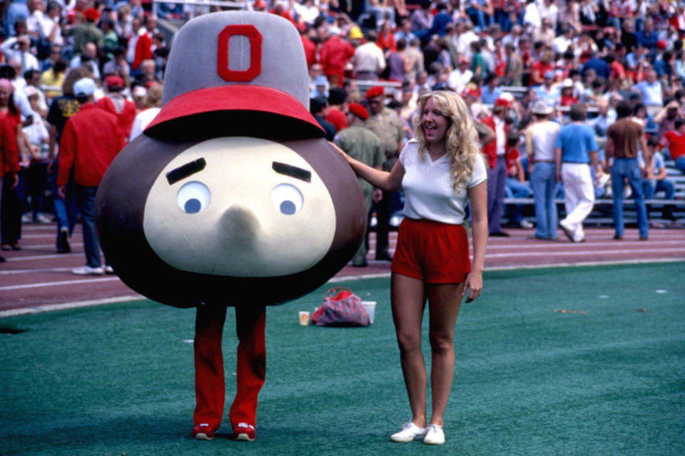 Brutus Buckeye with a cheerleader in 1977 (photo courtesy of The Ohio State University Archives)