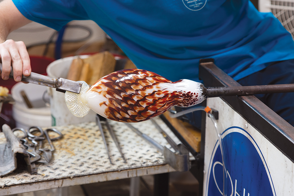 Glassblower works at the Ohio Glass Museum in Lancaster (photo by Rachael Jirousek)