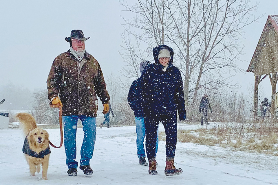 People hiking in the snow at Prairie Oaks Metro Park in West Jefferson (photo by Melissa Turpening)