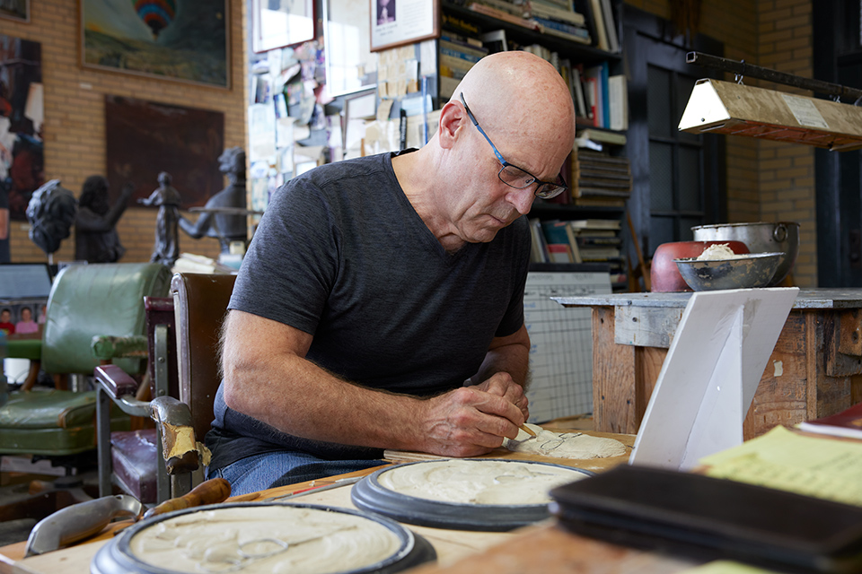 Zanesville sculptor Alan Cottrill at work in his studio (photo by Eric Wagner)