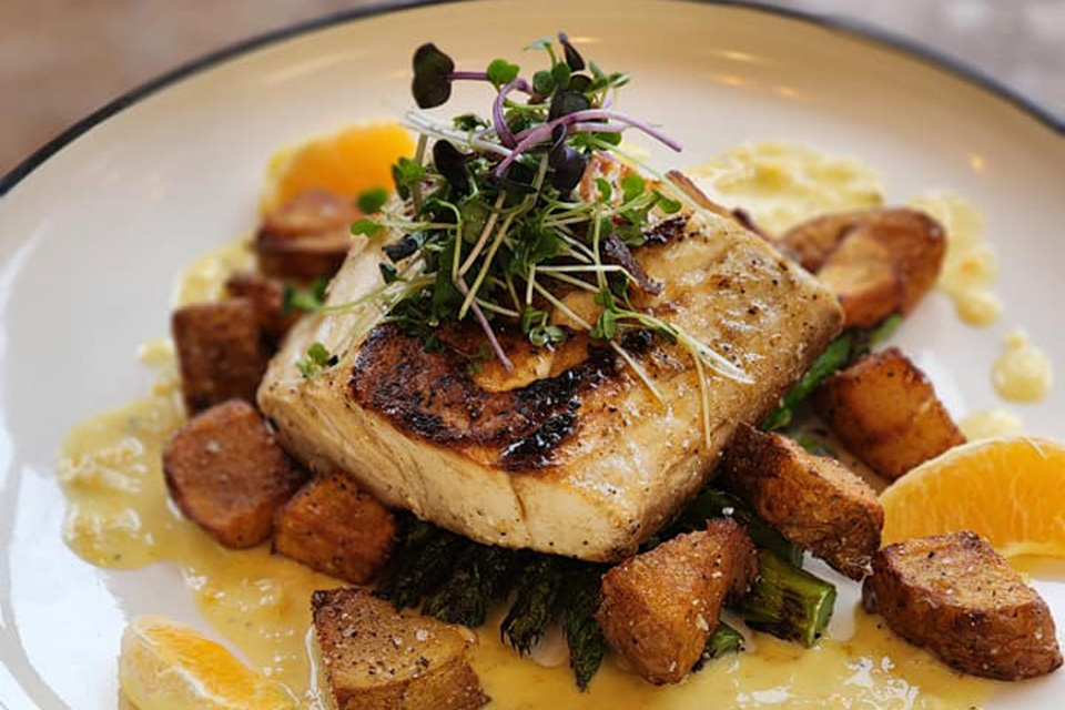 Fish, potatoes and greens at Charlo’s Provisions & Eatery in Springfield (photo courtesy of Charlo’s Provisions & Eatery)