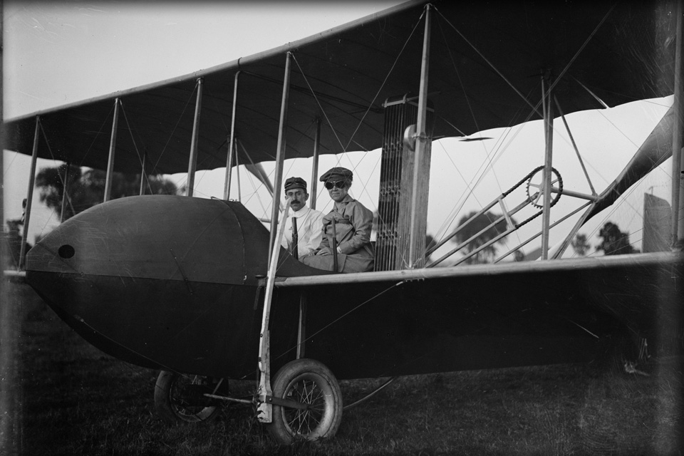 Katharine Wright on the Wright Model HS airplane with her brother Orville in 1915 (photo courtesy of Library of Congress)