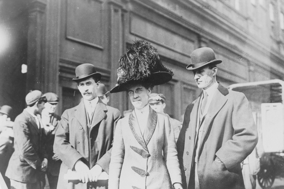 Orville, Katharine and Wilbur Wright standing together (photo from the collections of Dayton History)