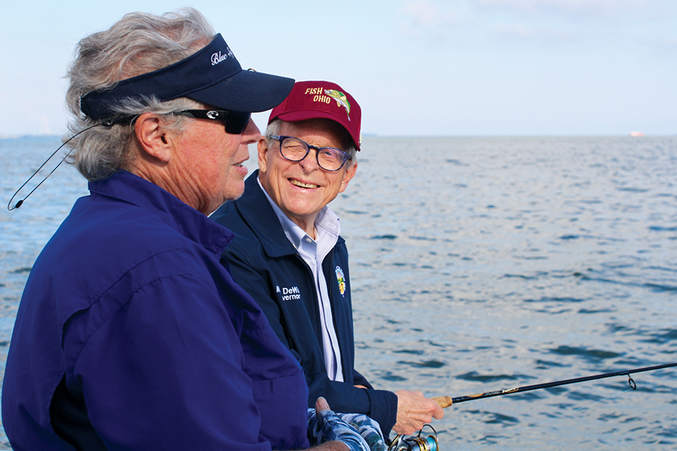 Peg VanVleet with Gov. Mike DeWine fishing during Fish Ohio Day (photo courtesy of Ohio Department of Natural Resources)
