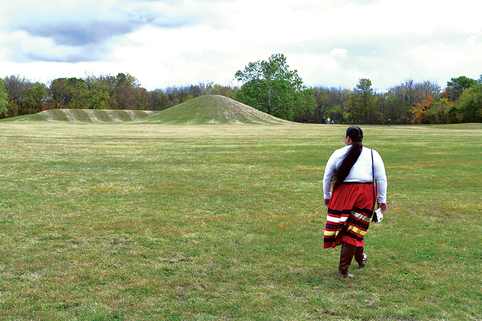 Native American woman at Earthworks at Hopewell Culture National Historical Park in Chillicothe (photo courtesy of National Park Service)