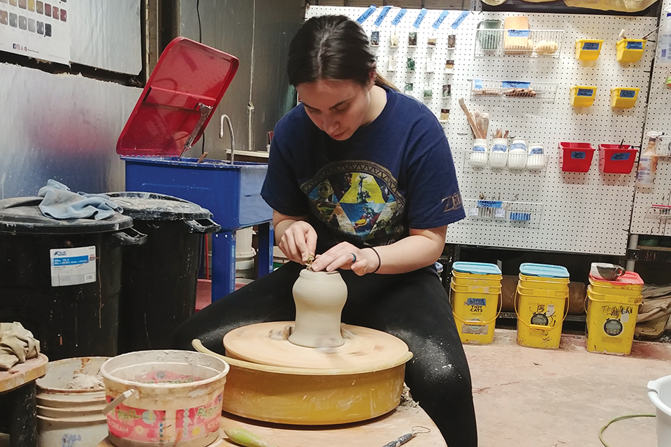 Woman doing pottery at Jack-Pot Pottery & Ceramic Supply in Millersburg (photo courtesy of Jack-Pot Pottery)
