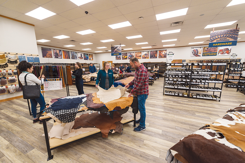 People looking at leather at Weaver Leather Supply in Holmes County (photo courtesy of Weaver Leather Supply)