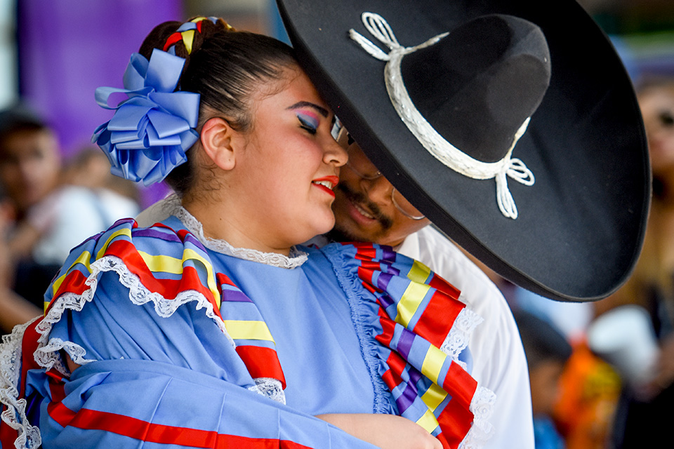 Man and woman dancing at Columbus’ ¡Festival Latino! (photo by Randall L. Schieber)