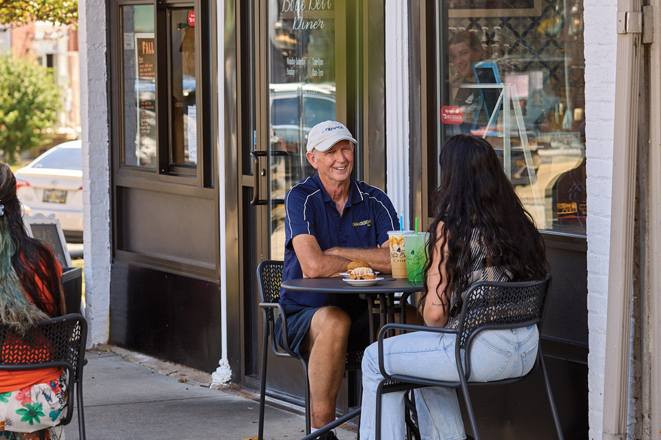 People talking outside Blue Bell Diner in McConnelsville (photo by Brian Kaiser)