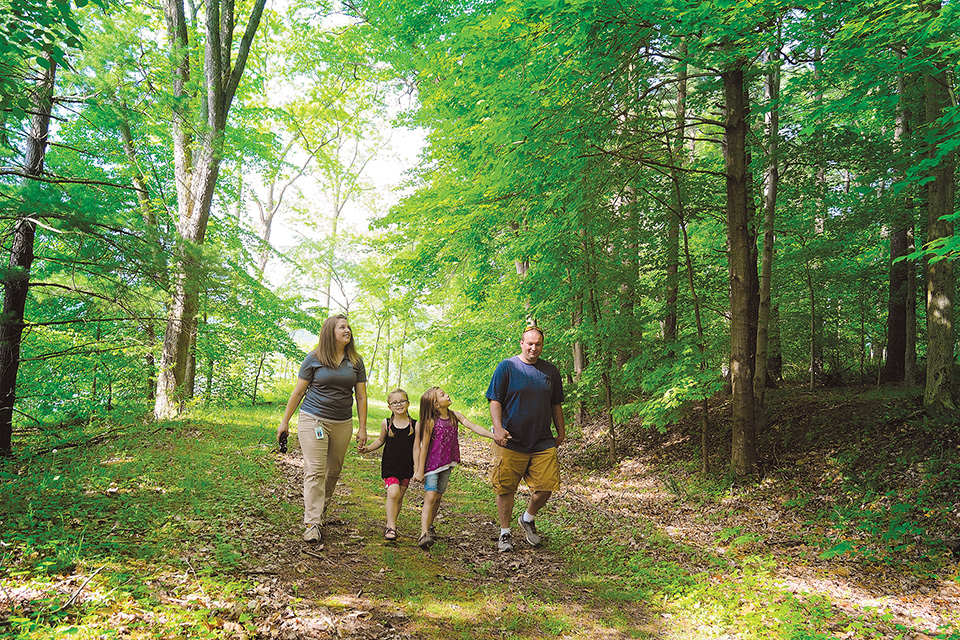 Family hiking on trails at Tappan Lake Park (photo courtesy of MWCD)
