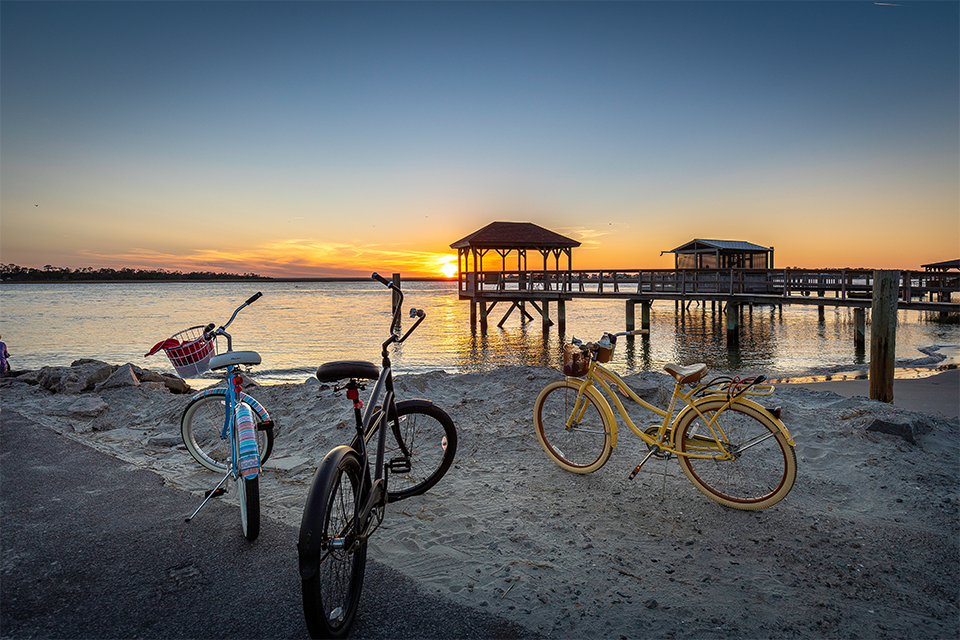 3 bikes on a beach